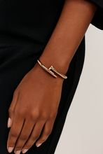 Load image into Gallery viewer, Nail-Inspired Gold Bangle | Modern Luxury Bracelet
